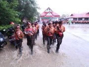 Diguyur Hujan, Ribuan Peserta Antusias Ikuti Lomba Gerak Jalan