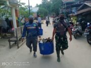 Kodim 0909 Kutim Gandeng PWI-SMSI Bersih-Bersih Kawasan Lingkar Sungai Masabang